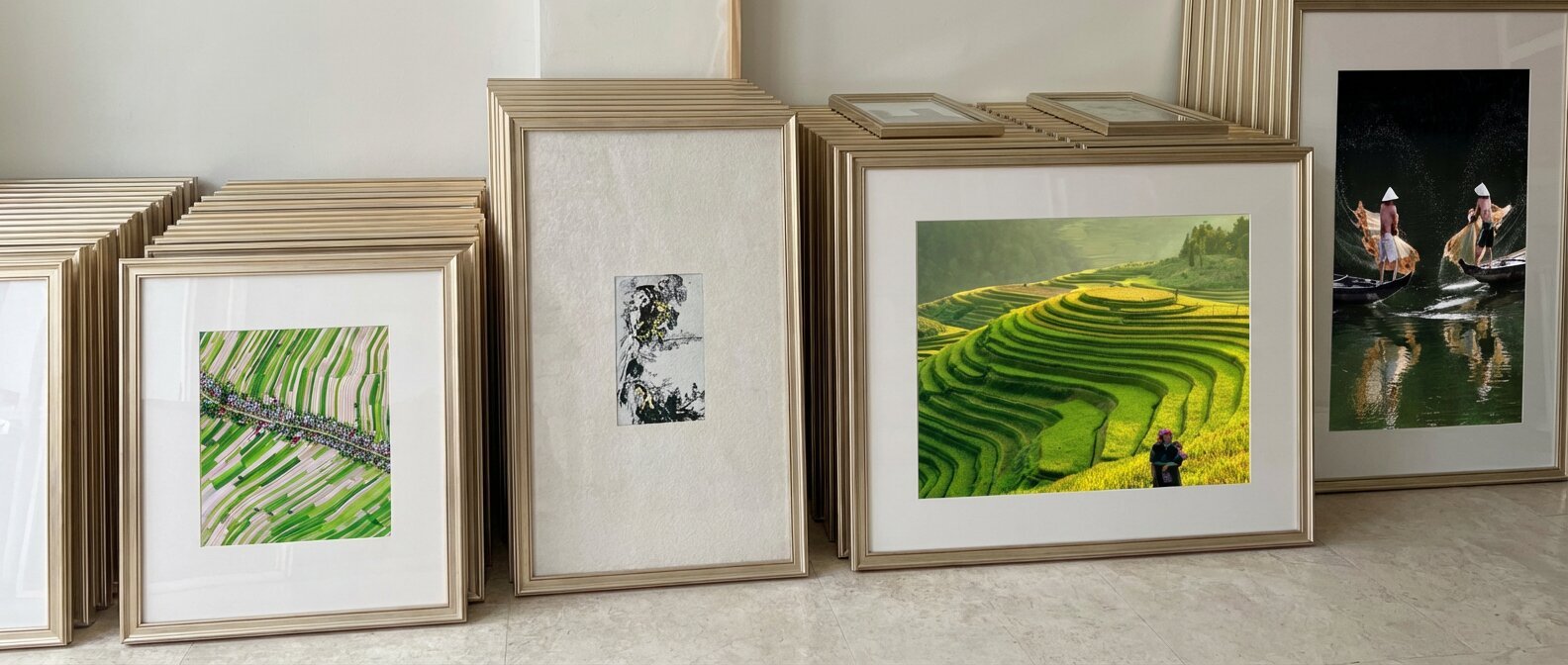 Artwork displayed in the Saigon studio of Artwork Vietnam, inviting visitors to Contact Us for custom commissions.