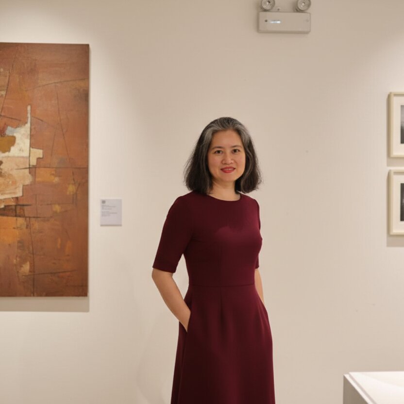 Vietnam Painters artist Mrs. Thao at an Art in Saigon art workshop, representing contemporary Vietnamese art craftsmanship.