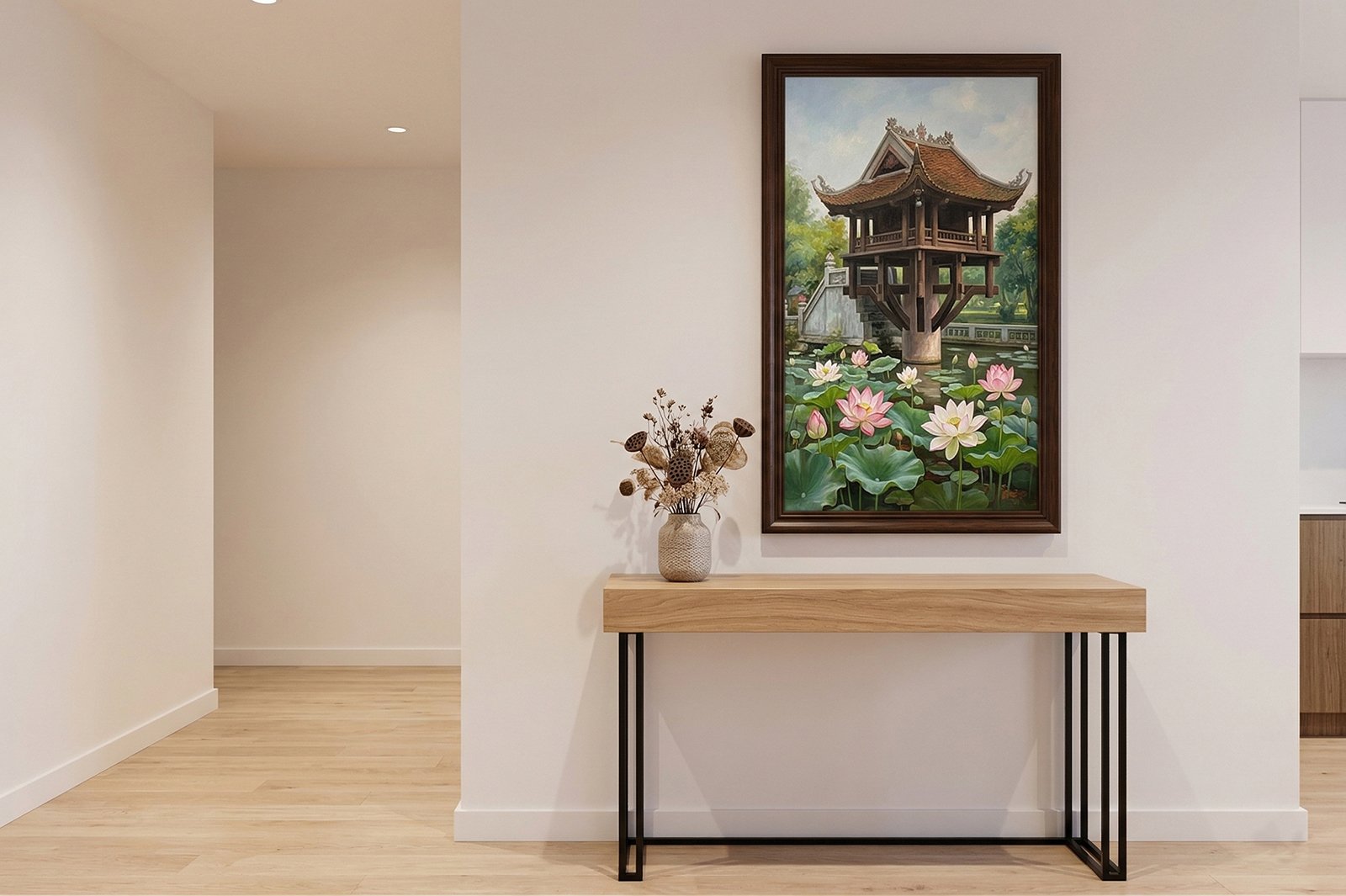 Vietnamese oil painting of a pagoda with lotus flowers in a modern apartment entryway